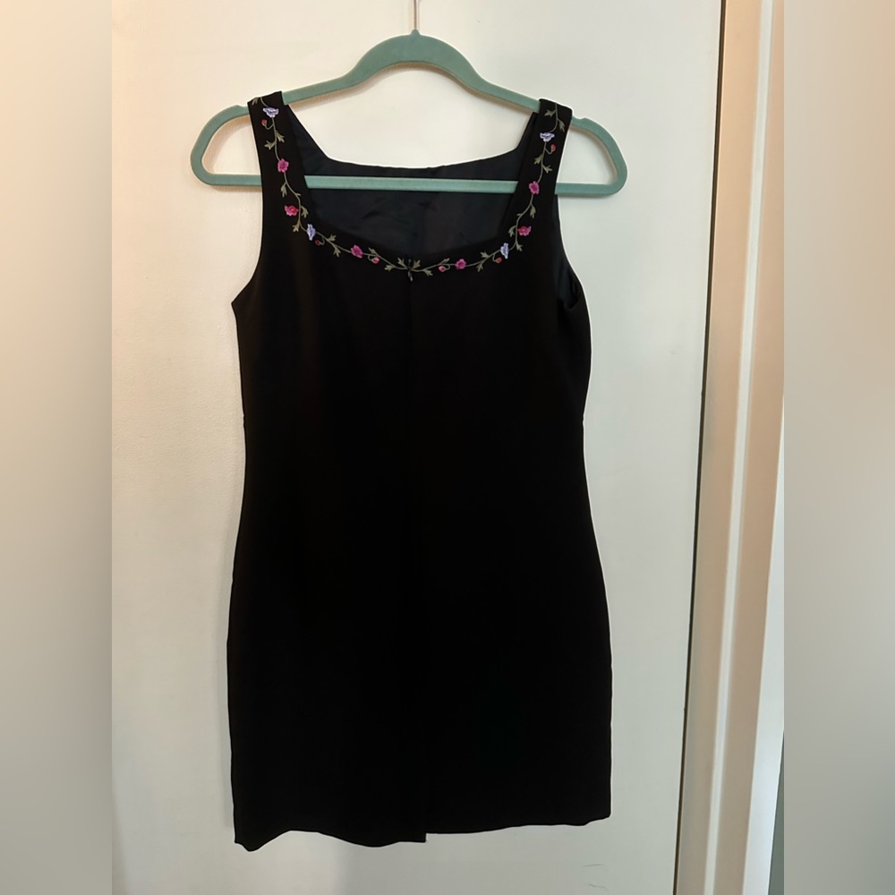 Vintage sleeveless, lined, little black dress with embroidered flower neckline
